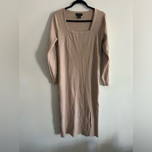 Stretchy dress with a short slit on the size. The brand is Rachel Zoe. Size L.